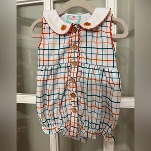 The Smocked Flamingo Plaid Sleeveless Romper with Pumpkin Embroidery